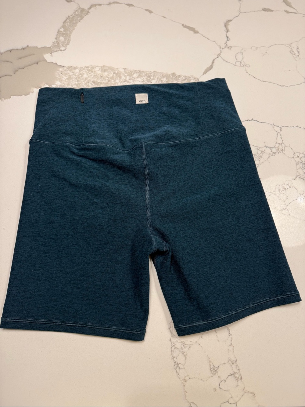 Vuori Women's High-Rise Bike Shorts in Teal Blue